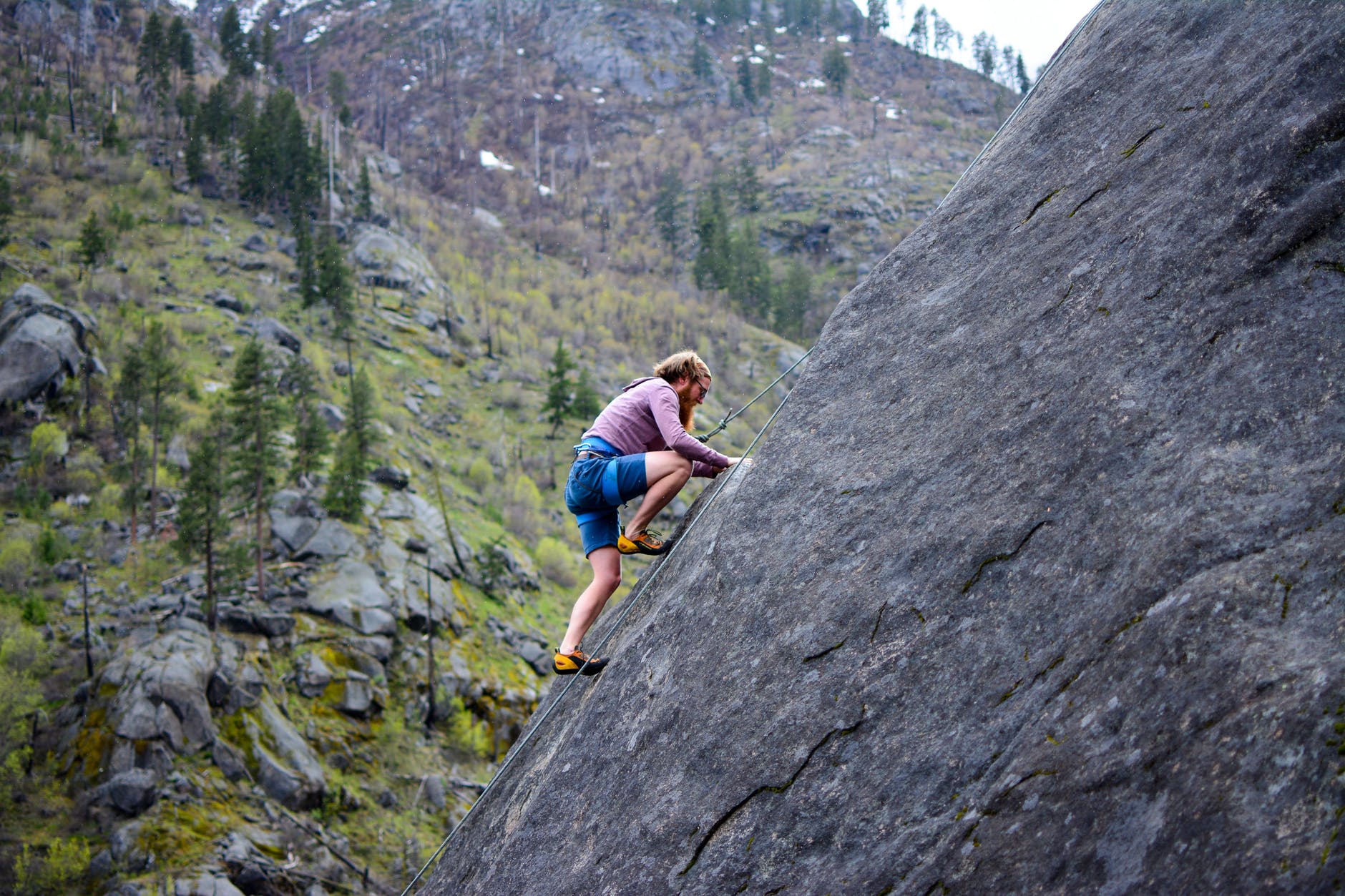 Girl Climbing mountain to finish the task