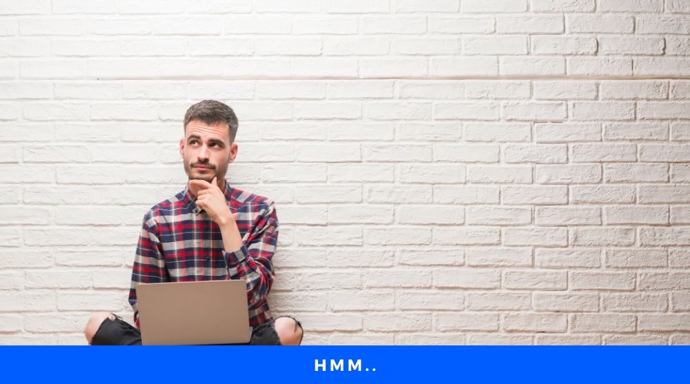 More Interesting and Simpler Man sitting infront of laptop