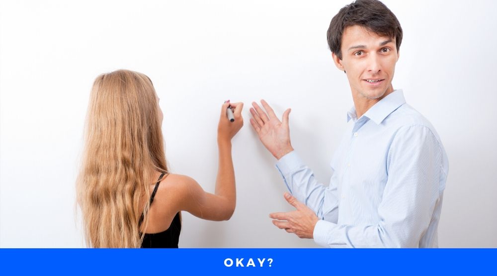 okay Girl solving problem on Board