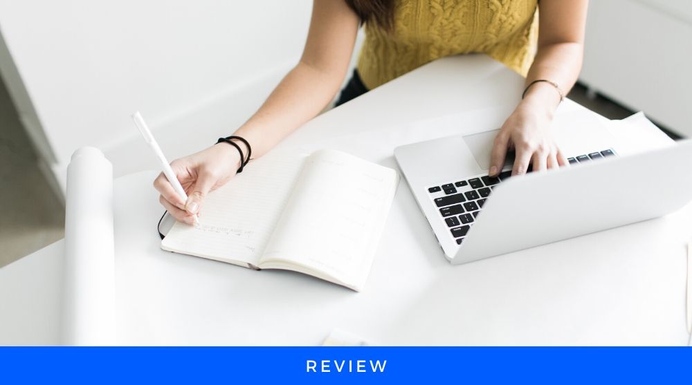 Review Hands on a laptop and writing reviews