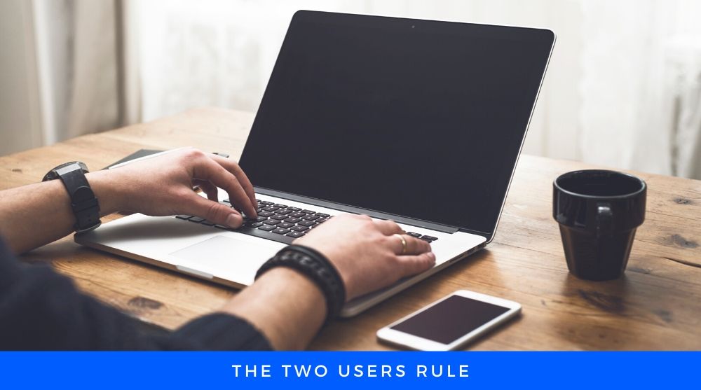 Hands Working on a Laptop and cell phone inside