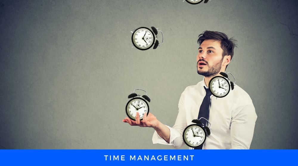 Man playing with Alarm Clocks